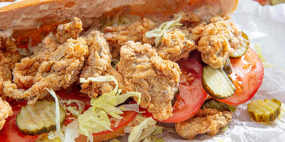 Dive into Cajun Delight with our Fried Oyster Po'Boy